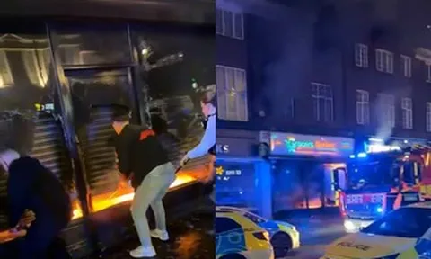 Nhờ người dân cạy cửa cuốn, người đàn ông thoát chết, bò ra từ biển lửa