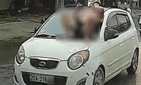 Xác minh clip người đàn ông cởi trần nằm trên nắp capo ô tô đang chạy ở Hà Nội