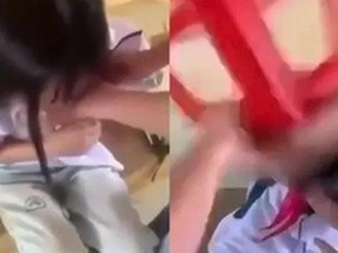 Nữ sinh lớp 8 bị bạn dùng ghế đánh vào đầu, cởi áo giữa lớp